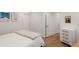 Bedroom featuring a comfortable bed, dresser, and stylish artwork at 670 Willoughby Ne Way, Atlanta, GA 30312