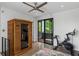 Exercise room featuring a sauna, stationary bike and sliding glass door to a balcony at 670 Willoughby Ne Way, Atlanta, GA 30312