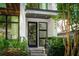 Modern home featuring a stylish front door and well-kept landscaping at 670 Willoughby Ne Way, Atlanta, GA 30312
