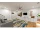 Bright living room with modern decor, hardwood floors, and a ceiling fan at 670 Willoughby Ne Way, Atlanta, GA 30312