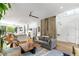 Open concept living room with hardwood floors and a clear view to the kitchen at 670 Willoughby Ne Way, Atlanta, GA 30312