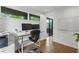 Second office view with a large white board, hardwood floors and lots of light at 670 Willoughby Ne Way, Atlanta, GA 30312
