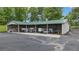 Barn featuring open bays, perfect for storing equipment and vehicles at 14501 Woolsey Rd, Hampton, GA 30228