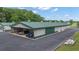Large barn with multiple bays, providing extensive storage and workspace options at 14501 Woolsey Rd, Hampton, GA 30228