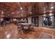 A basement game and bar area perfect for entertaining, complete with stone accents at 14501 Woolsey Rd, Hampton, GA 30228