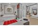 Elegant bathroom with marble accents, a standalone tub, and a glass-enclosed shower at 14501 Woolsey Rd, Hampton, GA 30228