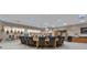 Large conference room featuring a spacious table and guitar display at 14501 Woolsey Rd, Hampton, GA 30228