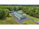 Aerial view of the large building with an open patio space at 14501 Woolsey Rd, Hampton, GA 30228