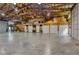 This is an immense garage with exposed beams and storage at 14501 Woolsey Rd, Hampton, GA 30228