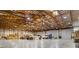 Immense storage with exposed beams and large overhead doors at 14501 Woolsey Rd, Hampton, GA 30228