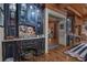 Hallway displaying custom-built cabinets, wood flooring, trim, and decor at 14501 Woolsey Rd, Hampton, GA 30228