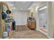 Inviting hallway features hardwood floors, stylish decor, and access to laundry area at 14501 Woolsey Rd, Hampton, GA 30228