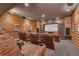 Private home theater with plush leather seating and a large projection screen at 14501 Woolsey Rd, Hampton, GA 30228