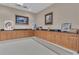 Functional kitchenette with extensive cabinetry, ample counter space, and neutral decor at 14501 Woolsey Rd, Hampton, GA 30228