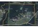 Aerial map of the acreage with labels for the log home and surrounding structures at 14501 Woolsey Rd, Hampton, GA 30228