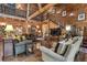 Cozy living room featuring a staircase, wood accents, and comfortable seating arrangement at 14501 Woolsey Rd, Hampton, GA 30228
