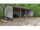 Outbuilding with ample storage capacity for equipment and materials at 14501 Woolsey Rd, Hampton, GA 30228