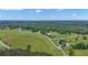 Aerial view of the acreage property with a white border line at 14501 Woolsey Rd, Hampton, GA 30228