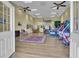 Large recreation room offers ample space for games, seating, and dining at 14501 Woolsey Rd, Hampton, GA 30228