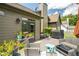 Back deck with seating and landscaping at 1511 Rocky Knoll Ln, Dacula, GA 30019
