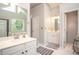 Bright bathroom with double vanity, soaking tub, and separate shower at 1511 Rocky Knoll Ln, Dacula, GA 30019