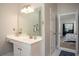 Bathroom vanity area with view of bedroom at 1511 Rocky Knoll Ln, Dacula, GA 30019