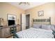 Bedroom featuring wood floors, a ceiling fan, and natural light at 1511 Rocky Knoll Ln, Dacula, GA 30019
