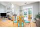 Bright breakfast nook offers a charming view and seamless flow to the adjoining living space at 1511 Rocky Knoll Ln, Dacula, GA 30019