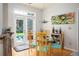 Cozy breakfast nook with seating for four and view to the backyard at 1511 Rocky Knoll Ln, Dacula, GA 30019
