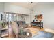 Inviting living room with hardwood floors, high ceilings, and a comfortable reclining sofa at 1511 Rocky Knoll Ln, Dacula, GA 30019