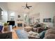 Spacious living room with vaulted ceilings, a fireplace, and hardwood floors at 1511 Rocky Knoll Ln, Dacula, GA 30019