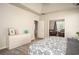 Comfortable main bedroom with hardwood floors, tray ceiling, and neutral walls at 1511 Rocky Knoll Ln, Dacula, GA 30019