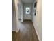 Bright foyer featuring stylish flooring and a view of the front door at 746 Great Oak Pl, Villa Rica, GA 30180
