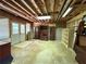 Unfinished basement with furniture and door leading to the outside at 851 Millvale Pl, Lawrenceville, GA 30044