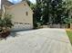 Long driveway leading to a two-car garage, offering parking space for multiple vehicles at 851 Millvale Pl, Lawrenceville, GA 30044