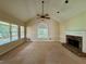 Bright living room with fireplace at 851 Millvale Pl, Lawrenceville, GA 30044