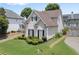 Charming two-story home with landscaped yard and manicured lawn in a suburban neighborhood at 1472 Lynchburg Pl, Marietta, GA 30062