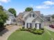 Charming two-story home with landscaped yard, stone accents, and a well-manicured lawn at 1472 Lynchburg Pl, Marietta, GA 30062