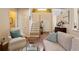 Comfortable living room with lots of natural light and staircase leading upstairs at 1472 Lynchburg Pl, Marietta, GA 30062