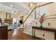 Bright living room with hardwood floors, vaulted ceiling, staircase and large windows at 1472 Lynchburg Pl, Marietta, GA 30062