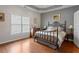 Cozy main bedroom with hardwood floors and lots of natural light at 1472 Lynchburg Pl, Marietta, GA 30062