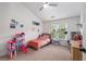 Charming bedroom with vaulted ceiling, plush carpet and play-house furniture with a window view to the outside at 1701 Clay Brooke Se Ct, Smyrna, GA 30082