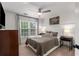 Cozy bedroom featuring neutral tones, large windows, and a comfortable upholstered bed at 1701 Clay Brooke Se Ct, Smyrna, GA 30082