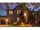 Beautiful two-story brick home with a well-manicured lawn and lush landscaping at 1701 Clay Brooke Se Ct, Smyrna, GA 30082