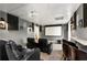 Home theater with comfortable seating, a large screen, and surround sound system at 1701 Clay Brooke Se Ct, Smyrna, GA 30082