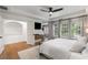 This main bedroom features hardwood floors, large windows, and access to the walk-in closet at 1701 Clay Brooke Se Ct, Smyrna, GA 30082