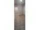 Hallway featuring wood-look floors and access to other rooms at 3106 Zodiac Ct, Lawrenceville, GA 30044