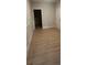 Spacious room features light wood floors, white trim and access to the exterior at 3106 Zodiac Ct, Lawrenceville, GA 30044