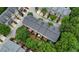 Aerial view of townhome community with mature landscaping, individual patios, and well-maintained roofs at 3202 Saute Way, Avondale Estates, GA 30002