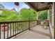 Cozy balcony features a woven rug, ceiling fan, and hanging plants at 3202 Saute Way, Avondale Estates, GA 30002